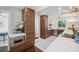 Modern kitchen featuring wood cabinetry, stainless steel appliances and hexagonal tiled floor at 4019 W Bay To Bay Blvd, Tampa, FL 33629