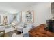Bright living room with stylish decor, comfortable seating, and eye-catching wall art at 4019 W Bay To Bay Blvd, Tampa, FL 33629