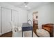 Bright office with a ceiling fan, neutral colors, and minimalist décor at 4019 W Bay To Bay Blvd, Tampa, FL 33629