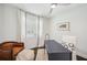Bright office with a ceiling fan, neutral colors, and minimalist décor at 4019 W Bay To Bay Blvd, Tampa, FL 33629
