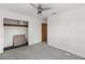 Bedroom with empty closet with shelves, ceiling fan, and a small doorway at 410 73Rd Ave, St Pete Beach, FL 33706
