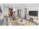 Staged living room showcasing furniture and decor, highlighting the space's potential at 410 73Rd Ave, St Pete Beach, FL 33706