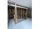 Bathroom in progress, showcasing exposed framework, new fixtures and a modern design at 4129 Dolphin Dr # 103, Tampa, FL 33617