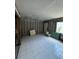 Bathroom featuring tiled floor, large window, and air conditioning unit in mid construction phase at 4129 Dolphin Dr # 103, Tampa, FL 33617