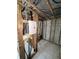 Exposed framing of bathroom remodel; wiring, block walls, and tiled floors at 4129 Dolphin Dr # 103, Tampa, FL 33617