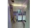 Bathroom with white cabinets, vanity, and toilet at 4148 Dolphin Dr # 3, Tampa, FL 33617