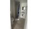 Bathroom featuring a shower, toilet, sink, and neutral flooring at 4150 Woodsville Dr, New Port Richey, FL 34652