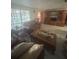 Living room area with hardwood floors and comfortable seating at 4150 Woodsville Dr, New Port Richey, FL 34652