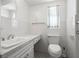 Bathroom with a white vanity, tile floors, and modern fixtures at 417 66Th S Ave, St Petersburg, FL 33705