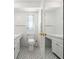 Bathroom featuring white tile floors, white vanity, and a toilet at 417 66Th S Ave, St Petersburg, FL 33705