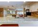Bright, open kitchen featuring granite countertops and stainless steel appliances at 4174 14Th Ne Ln, St Petersburg, FL 33703