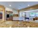 Bright kitchen featuring stainless steel appliances, granite countertops, and white cabinets at 4174 14Th Ne Ln, St Petersburg, FL 33703