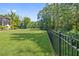 Expansive backyard with a secure fence, perfect for pets and outdoor activities at 4512 Cheval Blvd, Lutz, FL 33558