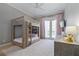 Shared room with a rustic wooden bunkbed, soft carpet, and a ceiling fan at 4512 Cheval Blvd, Lutz, FL 33558