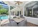 Outdoor seating area with pool views at 4512 Cheval Blvd, Lutz, FL 33558
