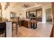 Open-concept living room with built-in shelving and a comfortable seating area at 4888 Sevilla Shores Dr, Wimauma, FL 33598