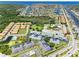 Capture the essence of waterfront living in this aerial view featuring lush greenery and scenic canal access at 4943 New England Blvd # 105, New Port Richey, FL 34652