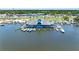 Take in a marina view from above showcasing a restaurant and docks along the water at 4943 New England Blvd # 105, New Port Richey, FL 34652
