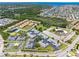 Discover the beauty of this community in an aerial view showing the lush landscaping and serene canal access at 4943 New England Blvd # 105, New Port Richey, FL 34652