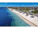 Wide-angle, overhead view of a beachfront area and the surrounding residential neighborhood at 4943 New England Blvd # 105, New Port Richey, FL 34652