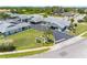 An aerial view of the community, displaying lush landscaping and convenient parking, blending comfort and convenience at 4943 New England Blvd # 105, New Port Richey, FL 34652