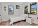 Well-lit bedroom with modern furnishings, natural lighting, and hardwood floors at 513 W Paris St, Tampa, FL 33604