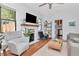 Living room features wood floors, fireplace, and lots of natural light at 513 W Paris St, Tampa, FL 33604