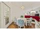 Cozy dining area is bathed in natural light with a seamless transition to the inviting living space at 5434 Wellfield Rd, New Port Richey, FL 34655