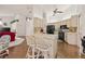 Bright kitchen seamlessly integrates with a casual dining area and enhances Gathering time and entertaining at 5434 Wellfield Rd, New Port Richey, FL 34655