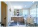 Bathroom featuring a double vanity, soaking tub and walk-in shower at 5465 Chestnut Ridge Rd, Dade City, FL 33523