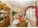 Formal dining room perfect for hosting elegant dinners and special occasions at 5465 Chestnut Ridge Rd, Dade City, FL 33523