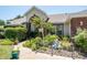 Charming single-story home with a well-manicured lawn and mature landscaping at 5465 Chestnut Ridge Rd, Dade City, FL 33523
