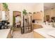 Bright kitchen with stainless steel appliances, tile flooring, and a functional layout for cooking and dining at 5465 Chestnut Ridge Rd, Dade City, FL 33523
