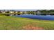 Enjoy lakefront views from this property's expansive backyard with an eye catching fountain at 5920 Silver Palm Blvd, Bradenton, FL 34211