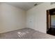 Neutral bedroom with carpet, white walls, and double door closet with bright white trim at 5920 Silver Palm Blvd, Bradenton, FL 34211
