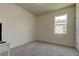 Bedroom with carpet flooring, bright window, and neutral color paint at 5920 Silver Palm Blvd, Bradenton, FL 34211