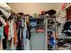 A walk-in closet featuring an extensive organization system to keep your belongings neat and tidy at 5920 Silver Palm Blvd, Bradenton, FL 34211