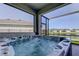 Relax in the hot tub with a view; this covered patio allows you to enjoy the outdoors, rain or shine at 5920 Silver Palm Blvd, Bradenton, FL 34211