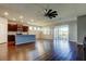 Spacious kitchen features an island, stainless steel appliances, and hardwood flooring at 5920 Silver Palm Blvd, Bradenton, FL 34211