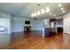 Bright kitchen features granite countertops, dark cabinetry, and stainless steel appliances at 5920 Silver Palm Blvd, Bradenton, FL 34211