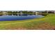 Picturesque pond view with fountain and lush green surroundings, adding to the community's serene atmosphere at 5920 Silver Palm Blvd, Bradenton, FL 34211