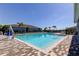 Sparkling community pool with ample seating, perfect for relaxation and enjoying sunny days in a resort-like setting at 5920 Silver Palm Blvd, Bradenton, FL 34211