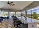 Stylish poolside bar area with counter seating, perfect for entertaining guests and enjoying refreshments by the pool at 5920 Silver Palm Blvd, Bradenton, FL 34211
