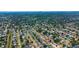 An aerial view of the neighborhood showcases the home's location among tree-lined streets and well-maintained properties at 5951 32Nd N Ave, St Petersburg, FL 33710