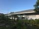 Charming single-story home with well-manicured lawn and mature landscaping at 611 N Bradford Ave, Tampa, FL 33609