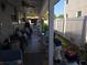 Covered patio featuring comfortable seating and garden views at 611 N Bradford Ave, Tampa, FL 33609