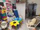 Room full of toys and storage cabinets at 611 N Bradford Ave, Tampa, FL 33609