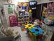 Room full of toys, a fire extinguisher, and storage cabinets at 611 N Bradford Ave, Tampa, FL 33609