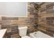 Bathroom shower with wood grain ceramic tile, rain shower head, white shower tub, and chrome trim at 6262 142Nd N Ave # 607, Clearwater, FL 33760