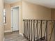 Hallway with railing and wood-look flooring at 6262 142Nd N Ave # 607, Clearwater, FL 33760